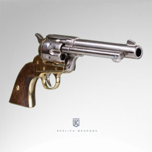 Vista perfil derecho de réplica de revolver Peacemaker Colt 45 USA 1873. Con cañón, tambor en metal pulido, cuerpo dorado y chachas de madera.