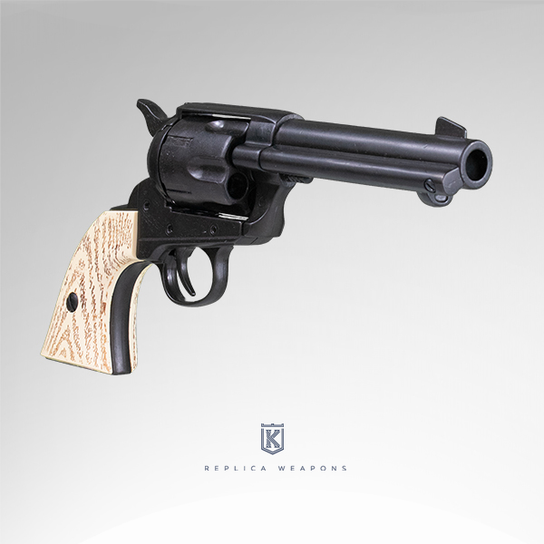 Vista perfil derecho de réplica kolser de revolver Colt fast draw Calibre 45. Con cañón, tambor y cuerpo en metal negro con cachas en marfil.