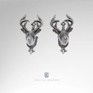 Réplica de soportes de pistola con forma de cabezas de ciervos. Terminado en color plata envejecido.