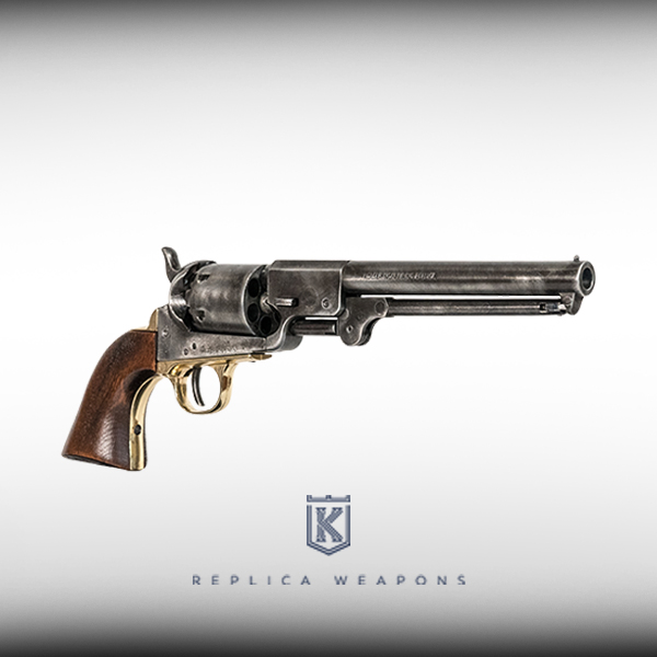 Vista perfil derecho de réplica de revolver Colt Navy Confederate 1862 calibre 36 con tambor y cuerpo en color metal envejecido y guarda dorada con cachas de madera.