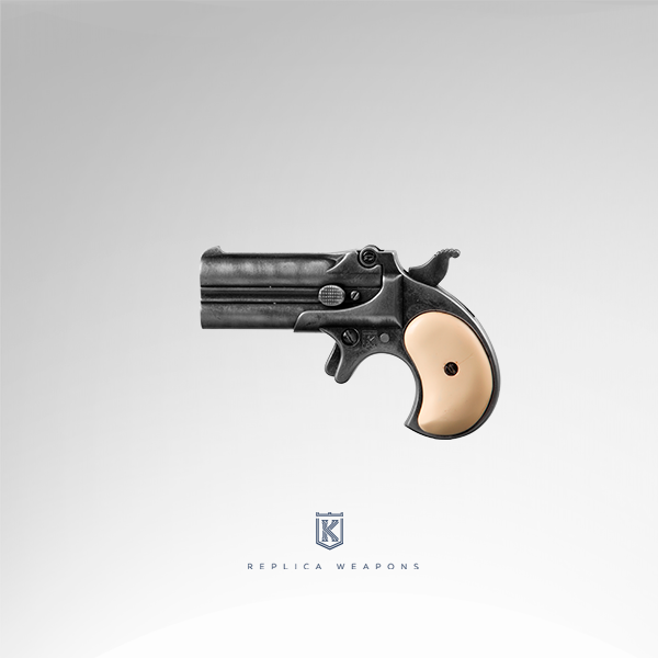 Réplica lateral izquierdo de pistola Derringer con empuñadura de imitación marfil y cuerpo metálico